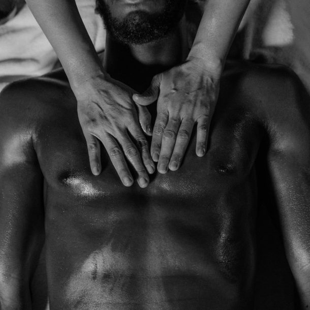 hands massaging male body