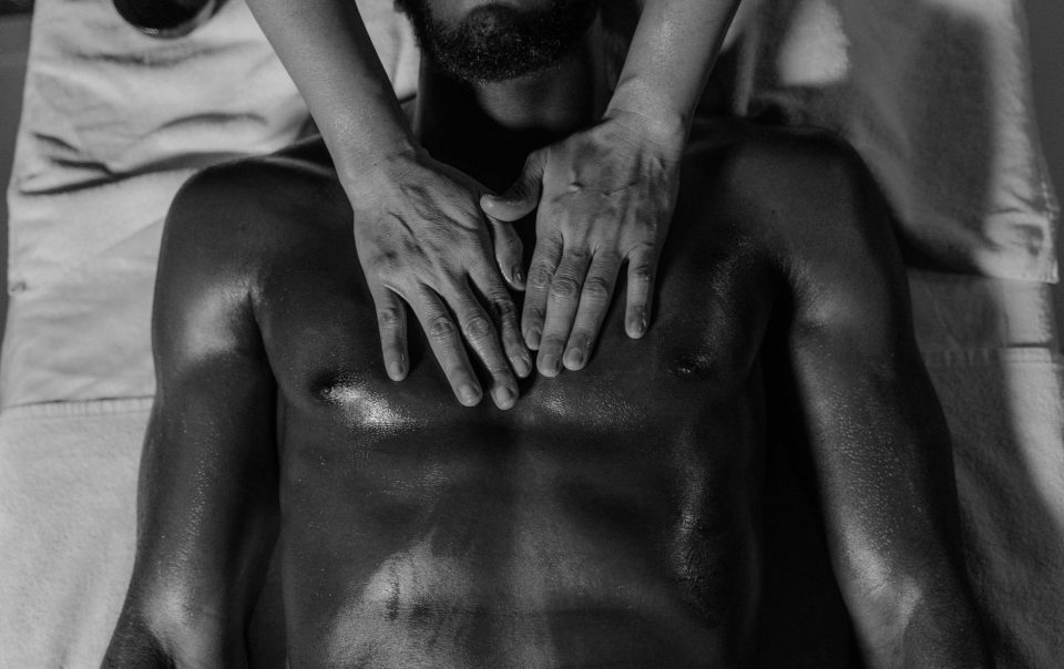hands massaging male body